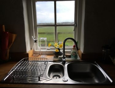 Cottage kitchen sink view