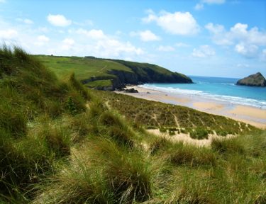 Dunes_@_Holywell_Bay_-_panoramio from wikimedia need to attribute owner
